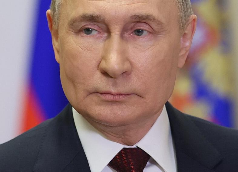 Путин